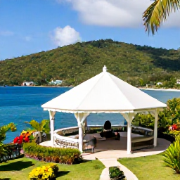 Caribbean Holidays, January Spa Breaks, Open-air Saint Lucia spa pavilion overlooking blue Caribbean water and green hills, tropical daytime scene
