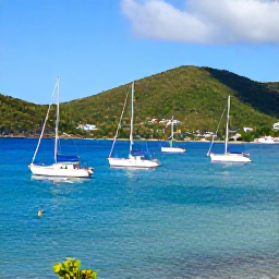 Caribbean Holidays, January Tours, Sunny Caribbean harbour in Saint Vincent and the Grenadines in January, with sailing boats, green hills and clear blue water