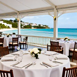 Caribbean Holidays, January Weddings, Elegant wedding reception at a waterside restaurant in Saint Martin, tables set for dinner with views across a Caribbean bay