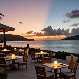 Caribbean Holidays, July Adults Only, Elegant adults-only resort terrace overlooking the Caribbean Sea at sunset in the United States Virgin Islands, with outdoor dining and soft lights