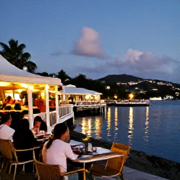 Caribbean Holidays, July Adventure Holidays, A relaxed evening scene in Gustavia, Saint Barth&eacute;lemy, with harbour lights, waterfront restaurants and visitors enjoying the Caribbean atmosphere