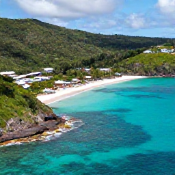 Caribbean Holidays, July All Inclusive, Aerial coastal view of Saint Vincent and the Grenadines in July, showing lush green hills, turquoise sea and a peaceful beach resort