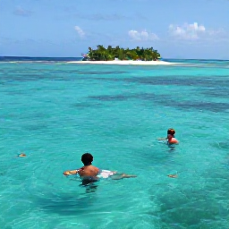 Caribbean Holidays, July All Inclusive, Snorkellers exploring clear turquoise water around a Caribbean island, with colourful fish and a small tropical beach in the background