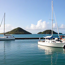Caribbean Holidays, July Fishing, A bright July morning at a British Virgin Islands marina, with fishing boats, calm turquoise water and green volcanic islands in the background