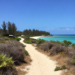 Caribbean Holidays, July Walking Holidays, A peaceful walking path on Bequia in the Grenadines beside turquoise water, dry tropical vegetation and a small sandy beach