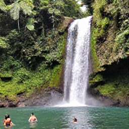 Caribbean Holidays, June Adventures, A scenic waterfall in Trinidad surrounded by bright green rainforest, with visitors swimming in a clear pool