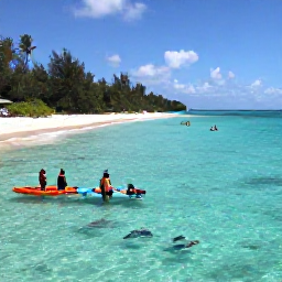 Caribbean Holidays, June Adventures, Sea kayakers and snorkellers exploring clear Caribbean water beside a quiet Grenadine island with colourful fish below