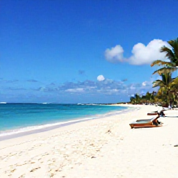Caribbean Holidays, June Beach Holidays, Wide white-sand beach and clear turquoise sea on Providenciales, Turks and Caicos Islands, with a few relaxed sunloungers and palm trees