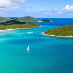 Caribbean Holidays, June BVI Holidays, Aerial view of the British Virgin Islands with turquoise sea, green islands and a sailing boat in June sunshine