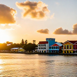 Caribbean Holidays, June Instagram Hotspots, Golden sunrise over Basseterre harbour and colourful Caribbean buildings on Saint Kitts