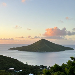 Caribbean Holidays, June Nature Holidays, A peaceful sunset over the Caribbean Sea from a green island viewpoint in the United States Virgin Islands