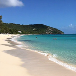 Caribbean Holidays, June Nature Holidays, A quiet tropical beach on Saint Barth&eacute;lemy in June, clear turquoise water, pale sand, green hills and a relaxed Caribbean atmosphere