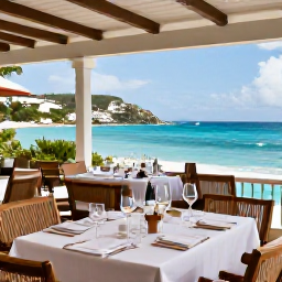 Caribbean Holidays, June Wine Tasting, Elegant wine tasting on a shaded terrace overlooking a turquoise Caribbean bay in Saint Barth&eacute;lemy