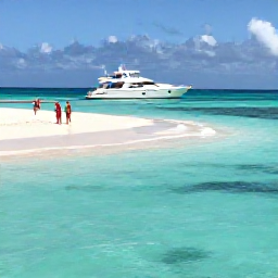 Caribbean Holidays, Luxury Bahamas May, Luxury yacht cruising between the Exuma cays in May, clear shallow water, white sandbars and a couple enjoying the view