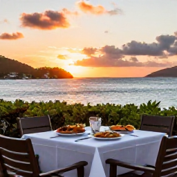 Caribbean Holidays, March Adults Only, Outdoor table for two at a Caribbean restaurant in the United States Virgin Islands at sunset, with local food and sea views