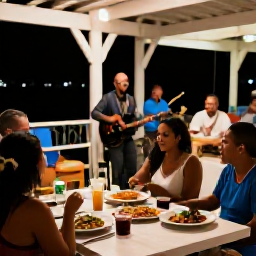 Caribbean Holidays, March Adventures, Visitors enjoying a relaxed evening at a small Montserrat restaurant with local Caribbean food and live music