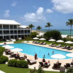 Caribbean Holidays, March All Inclusive, A welcoming Aruba all-inclusive resort with a swimming pool, sun loungers, tropical gardens and guests enjoying a relaxed March holiday