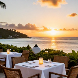 Caribbean Holidays, March Escapes, Elegant adults-only resort restaurant in the British Virgin Islands at sunset, outdoor tables, Caribbean sea and warm evening light