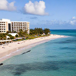 Caribbean Holidays, March Holidays, A sunny aerial view of a Dominican Republic all-inclusive resort beside a calm turquoise Caribbean beach in March