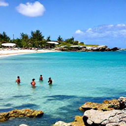 Caribbean Holidays, March Tours, Snorkellers in clear turquoise water beside a tropical beach and rocky coves around Saint Martin