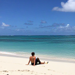 Caribbean Holidays, March Walking Holidays, A walker resting beside a white sand beach on Saint John, looking across clear Caribbean water beneath a blue sky
