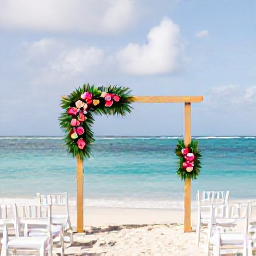 Caribbean Holidays, March Weddings, An elegant Dominican Republic beach wedding ceremony with white chairs, tropical flowers and calm turquoise sea