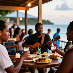 Caribbean Holidays, Martinique Backpacking, Friendly Martinique evening scene with local food, rum drinks and live music in a small coastal town
