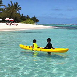 Caribbean Holidays, Martinique February Holidays, Children paddling in shallow clear water on a sheltered Martinique beach while parents relax nearby