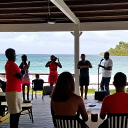 Caribbean Holidays, Martinique in May, Friendly Martinique cultural evening in May with local musicians, dancers and visitors gathered at an outdoor waterfront venue