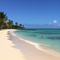 Caribbean Holidays, Martinique Multi-Country Holidays, Palm-fringed Martinique beach with clear turquoise water, soft sand and snorkellers enjoying calm March sunshine