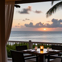Caribbean Holidays, Martinique Wellness, A calm evening view from a Martinique hotel terrace overlooking the sea, with soft sunset light and a relaxed table setting