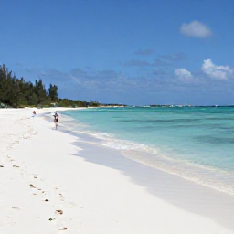 Caribbean Holidays, May Adults-Only Holidays, Adults relaxing on a quiet white-sand beach in Providenciales, Turks and Caicos, with turquoise water and soft May sunshine