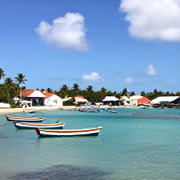Caribbean Holidays, May Fishing, Quiet tropical harbour in Bequia with colourful boats, palm trees and a relaxed Caribbean village atmosphere in May