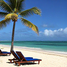 Caribbean Holidays, May Tours, Relaxed Caribbean beach day at Orient Bay in May, with sun loungers, palm trees and calm turquoise sea