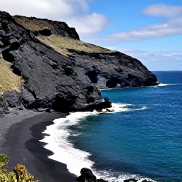 Caribbean Holidays, Montserrat Adventure Holidays, A guided boat tour approaching Montserrat's dramatic volcanic coastline, with black sand beaches, cliffs and clear Caribbean sea