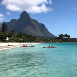 Caribbean Holidays, Montserrat Adventure, Kayakers and snorkellers enjoying clear turquoise water beside a quiet tropical beach on Montserrat