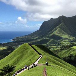 Caribbean Holidays, Montserrat December, Peaceful Montserrat landscape in December with lush green hills, volcanic scenery, coastline and a small group of visitors exploring