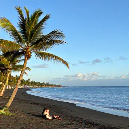 Caribbean Holidays, Montserrat February, A peaceful black-sand beach on Montserrat with palm trees, clear blue water and a couple enjoying a February afternoon