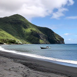Caribbean Holidays, Montserrat Fishing June, Relaxed coastal scene on Montserrat with a fishing boat returning towards shore, black sand beach and green hills