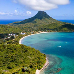 Caribbean Holidays, Nature Holidays, Aerial view of lush Saint Vincent and the Grenadines islands, turquoise sea, green hills and a small sailing boat