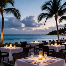 Caribbean Holidays, November Adults-Only Holidays, Elegant adults-only Caribbean resort restaurant serving dinner beside the sea, candlelit tables, tropical evening and smart casual atmosphere