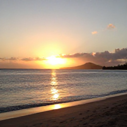 Caribbean Holidays, November Adventures, A relaxed sunset beach scene on Nevis, with golden light, calm Caribbean water and distant Saint Kitts across the channel