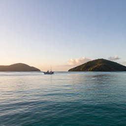 Caribbean Holidays, November Fishing, A calm turquoise bay in the British Virgin Islands at sunrise, with a small fishing boat near the islands