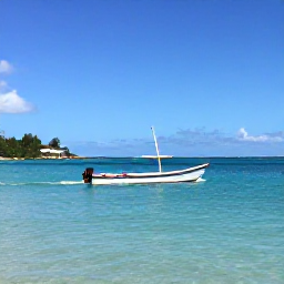 Caribbean Holidays, November Fishing, A small fishing boat cruising across clear turquoise water off the coast of Saint Barth&eacute;lemy on a sunny November morning