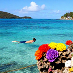 Caribbean Holidays, November Holidays, Clear turquoise sea with a snorkeller exploring colourful reef fish near a Caribbean beach in the United States Virgin Islands