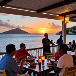 Caribbean Holidays, November Holidays, Sunset over a Caribbean waterfront restaurant in the United States Virgin Islands, with diners enjoying local food and live music