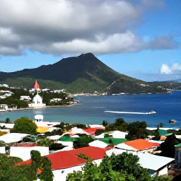 Caribbean Holidays, November Instagram Spots, A viewpoint overlooking Kingstown, Saint Vincent, with colourful rooftops, a busy harbour and green mountains under a partly cloudy November sky