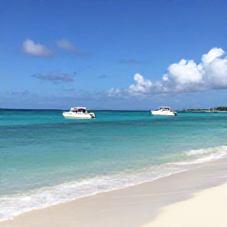 Caribbean Holidays, November Tours, Bright turquoise sea, white sand beach and a small excursion boat near Providenciales in the Turks and Caicos Islands