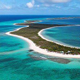 Caribbean Holidays, October Adventures, Aerial photograph of turquoise water, white sand beaches and low green islands in Turks and Caicos under a bright October sky