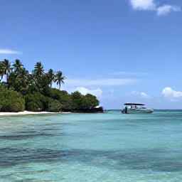 Caribbean Holidays, October Diving, Small dive boat travelling across calm turquoise water near Tobago&rsquo;s green coastline on a bright October morning